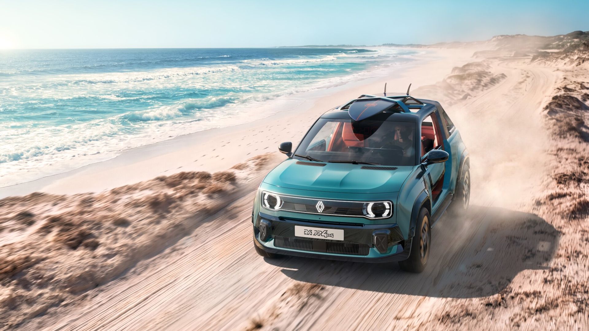 Renault 4 JP4x4 Concept — przód, dynamiczna jazda po plaży w tumanie piasku