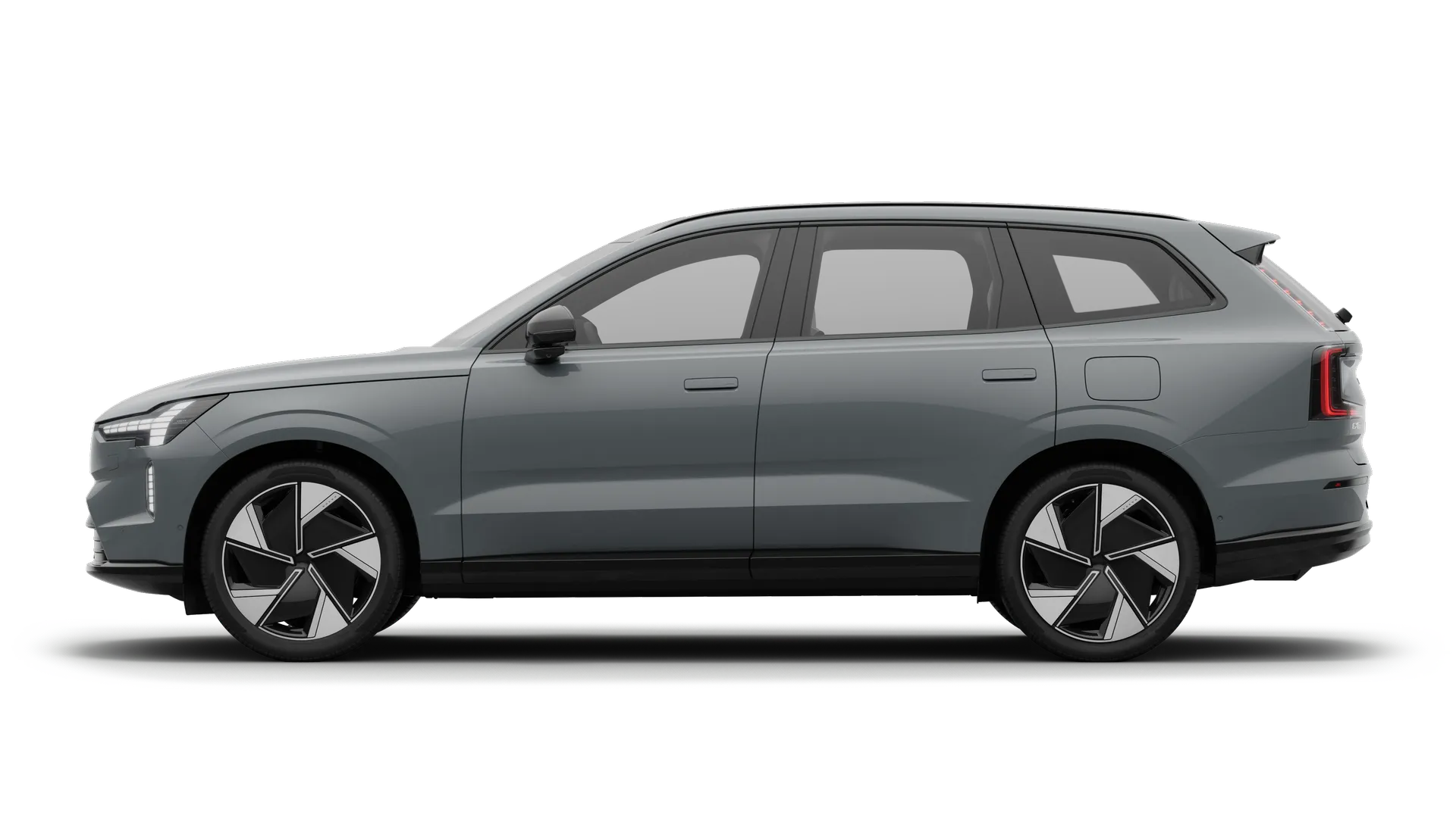 Volvo XC40 — bok, czarny tło